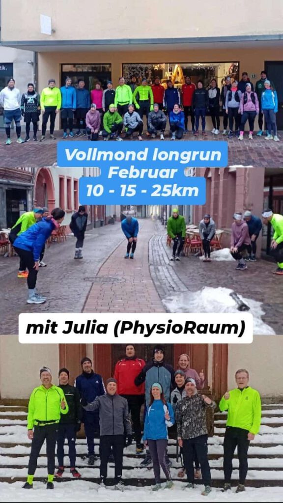 Eine Gruppe von Läufern in bunten Trainingsoutfits versammelt sich vor einem Gebäude auf einer gepflasterten Straße. Einige Teilnehmer halten Seile. Winterliche Bedingungen sind im Hintergrund sichtbar.