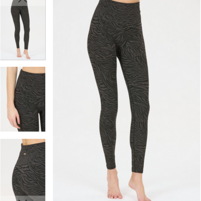 Die Athlecia Anana Tight in Schwarz mit tierischem Muster, erhältlich in den Größen S/M und L/XL, aus einem nahtlosen Material, bietet eine bequeme Passform für sportliche Aktivitäten.