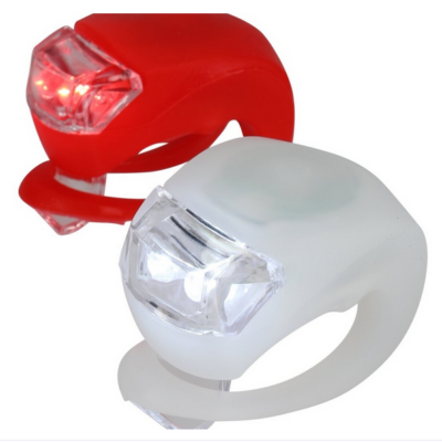 LED Light Set von Salzmann, bestehend aus einem roten und einem weißen LED-Licht mit transparentem Gehäuse. Beide Lichter haben eine gummierte Halterung für eine einfache Montage, ideal für Sicherheit und Sichtbarkeit bei Nacht.