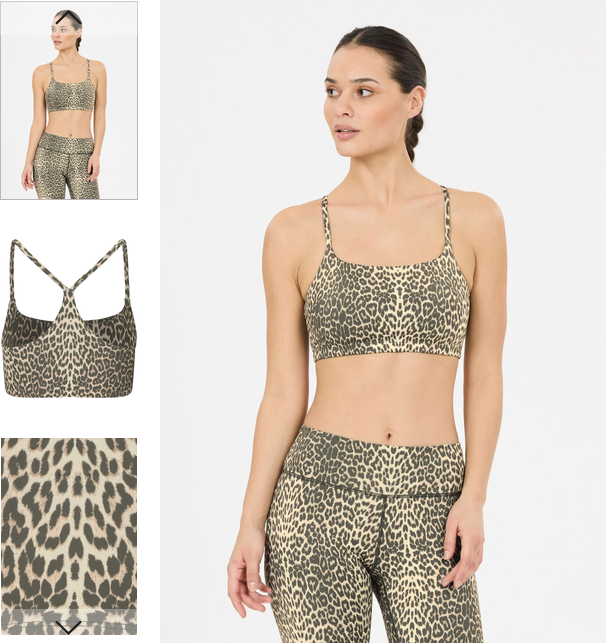 Athlecia Windia V2 W Printed Sports Bra in Beige mit Leopardenmuster, aus glattem Material, an einer Frau mit passender Leggings vor hellem Hintergrund.